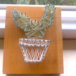 Nails and yarn cute for decorations and making lively spaces livelier.